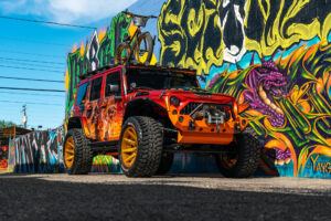 22x12 M25 OffRoad Monster Wheels on the 2021 SEMA Orange Jeep JK