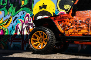 22x12 M25 OffRoad Monster Wheels on the 2021 SEMA Orange Jeep JK